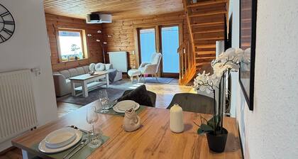 Charming wooden house in an idyllic location - perfect for switching off