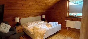 Charming wooden house in an idyllic location - perfect for switching off