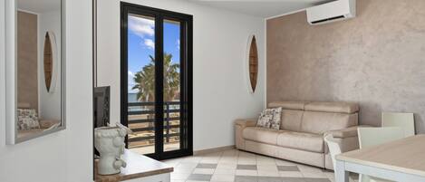 Standard Apartment, Balcony, Sea View | Living area