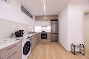 Comfort Apartment | Private kitchen | Full-size fridge, oven, espresso maker, coffee/tea maker