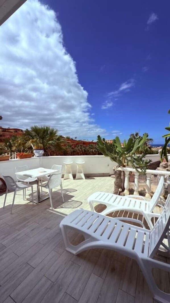 Appartement, vue baie | Restauration extérieure