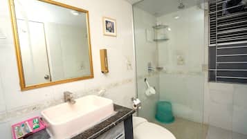 Shower, hair dryer, towels, soap