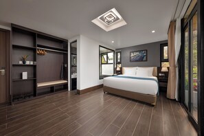 Suite Deluxe, 2 habitaciones, baño privado, vistas al complejo turístico | Sábanas de algodón egipcio y ropa de cama de alta calidad