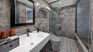 Superior Room, 1 King Bed, Balcony, Garden Area | Bathroom | Shower, hydromassage showerhead, designer toiletries, hair dryer