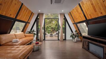 Elite Quadruple Room, 2 Bedrooms, Connecting Rooms, Pool View | Living area | 80-inch Smart TV with cable channels, Netflix, first-run movies
