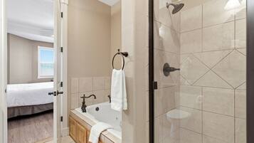 Shower, jetted tub, hair dryer, towels