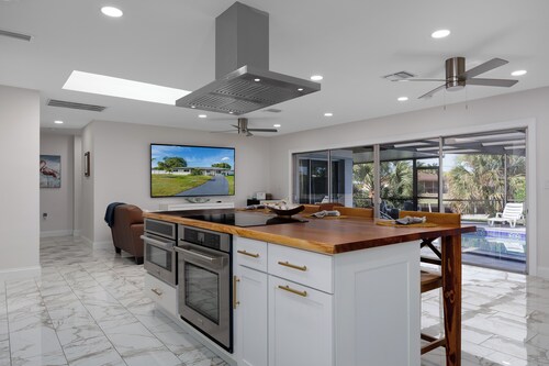 Waterfront Canal Home w/ Private Pool . Family Getaway . New Rental