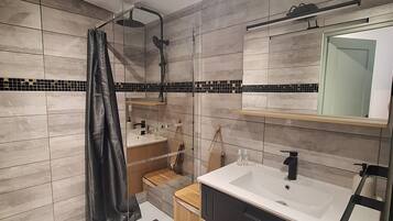 Shower, hair dryer, towels, toilet paper
