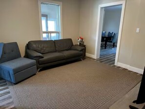 Departamento, vista a la ciudad | Área de sala de estar