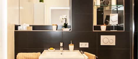 Hair dryer, towels, soap, toilet paper