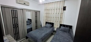 2 habitaciones, tabla de planchar con plancha y wifi gratis 