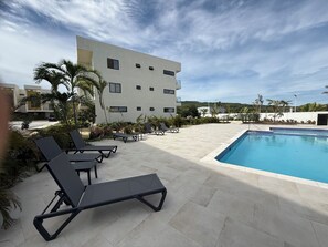 Pool - Come relax in a modern beach side 1 bedroom apartment (Llandovery)