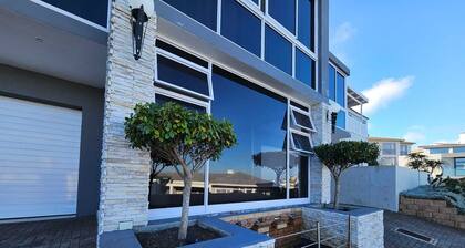 Africa’s #1 course meets the ocean, a private beach, total security & freedom.