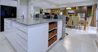 Africa’s #1 course meets the ocean, a private beach, total security & freedom.