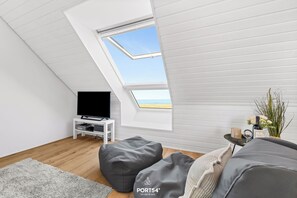 TV, peis, DVD-spiller og bøker
