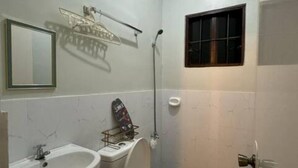 Dutxa, bidet, tovalloles i sabó 