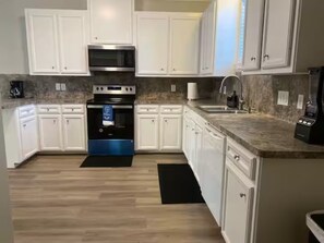 Private kitchen - Cozy 2BR Townhome in Peaceful Humble • Fast WiFi & AC_A (Humble)