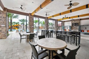 Outdoor dining - 7BR Resort Pool Home Near Disney - 8004 (Davenport)