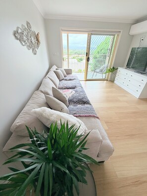 Living area - The Dell: A Poolside Family Holiday Home 5 minutes to beach (Banora Point)