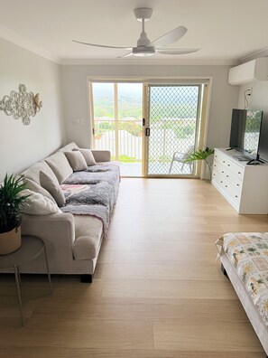 Living area - The Dell: A Poolside Family Holiday Home 5 minutes to beach (Banora Point)