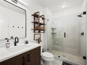 Shower, hair dryer, towels