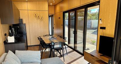 The Pink Lake Tiny House - 'Dandelion' - deluxe tiny house with pink lake views.