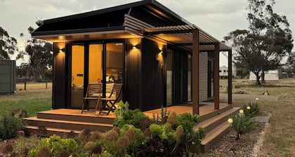 The Pink Lake Tiny House - 'Dandelion' - deluxe tiny house with pink lake views.