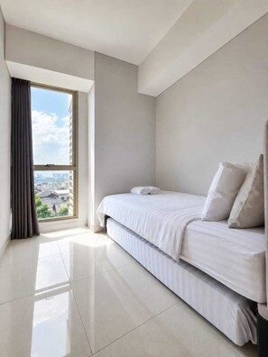 Apartamento, 3 quartos, vista para a cidade | Escrivaninha, ferros/tábuas de passar roupa, Wi-Fi de cortesia