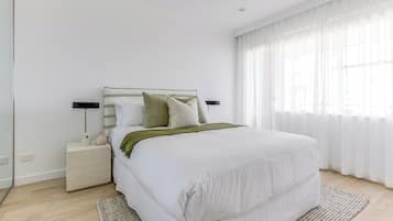 Two Bedrooms Ocean View Apartment | Desk, laptop workspace, iron/ironing board, cribs/infant beds