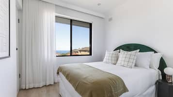 Two Bedrooms Ocean View Apartment | Desk, laptop workspace, iron/ironing board, cots/infant beds