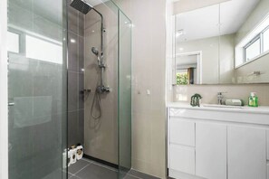 Shower, hair dryer, shampoo