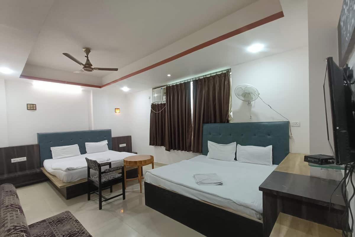 Deluxe Quadruple Room, City View