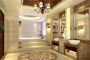 Ein luxuriöses Badezimmer mit einer großzügigen Badewanne, zwei Waschbecken und einem dekorativen Spiegel.