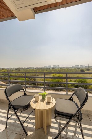 Deluxe Double Room, Balcony, City View | Property grounds - The Regal Yashobhoomi (New Delhi)