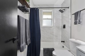 Hair dryer, towels, soap, shampoo