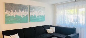 Luxurious 3-room apartment for 2-7 guests - modern, large balcony & parking space