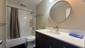 Hair dryer, towels, soap, shampoo
