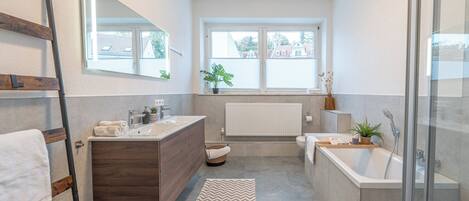 Hair dryer, towels, soap, toilet paper