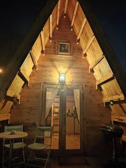 fully-equipped wooden chalet with whirlpool bath