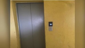 A closed elevator door with a control panel on the wall. - Quantity studio in Ngara, 3mins drive to Nairobi Cbd (Nairobi)