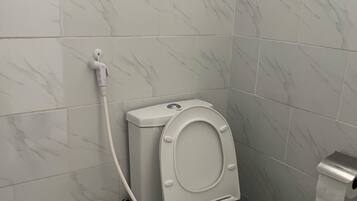 Shower, bidet, towels, soap