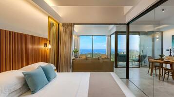 Deluxe Suite, Balcony, Ocean View | In-room safe, desk, laptop workspace, blackout curtains
