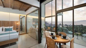 Deluxe Suite, Balcony, Ocean View | In-room safe, desk, laptop workspace, blackout curtains