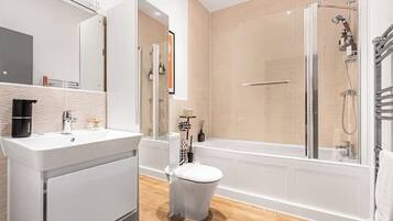 Shower, hair dryer, towels, soap