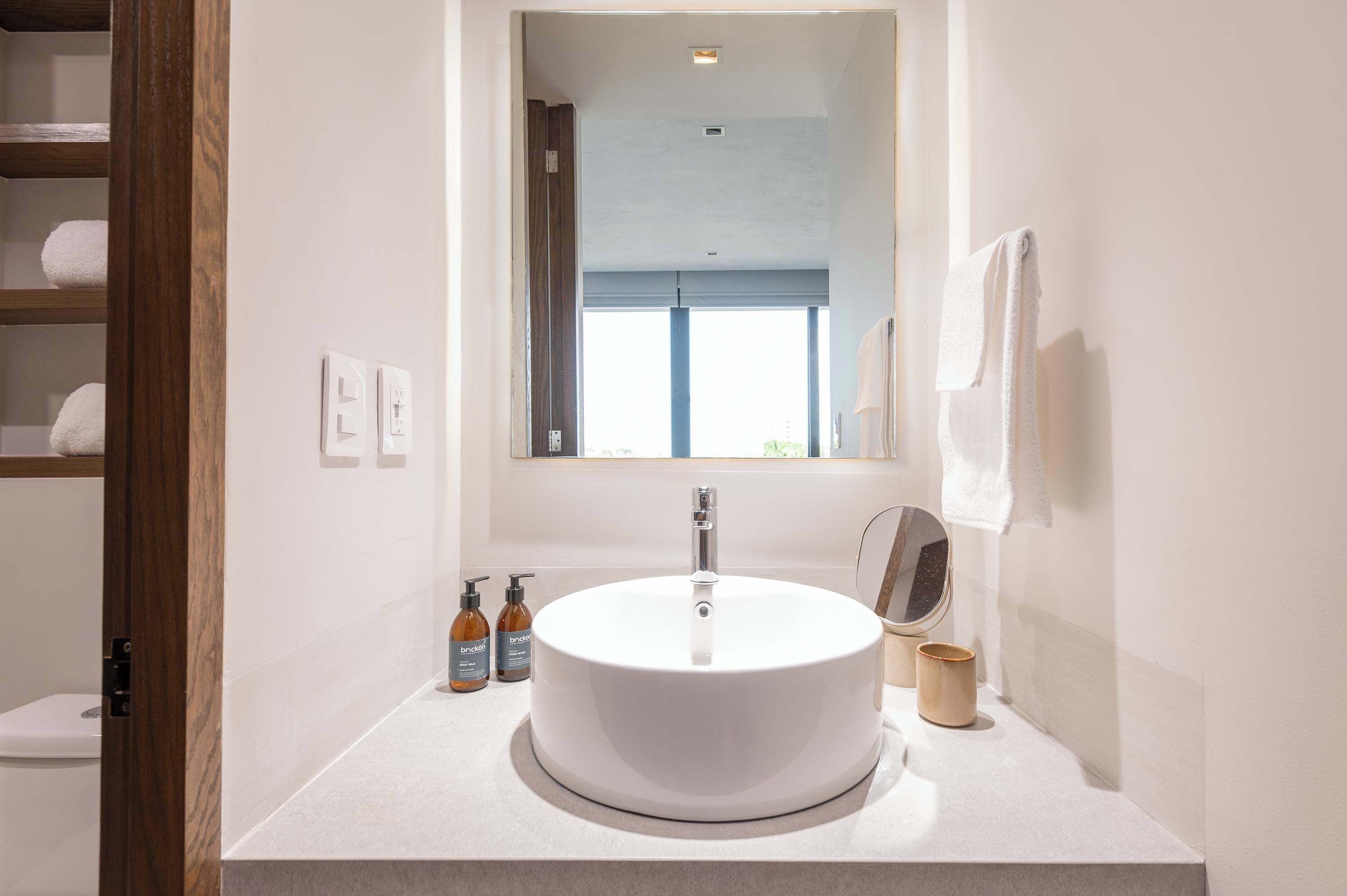 Shower, hair dryer, towels, shampoo