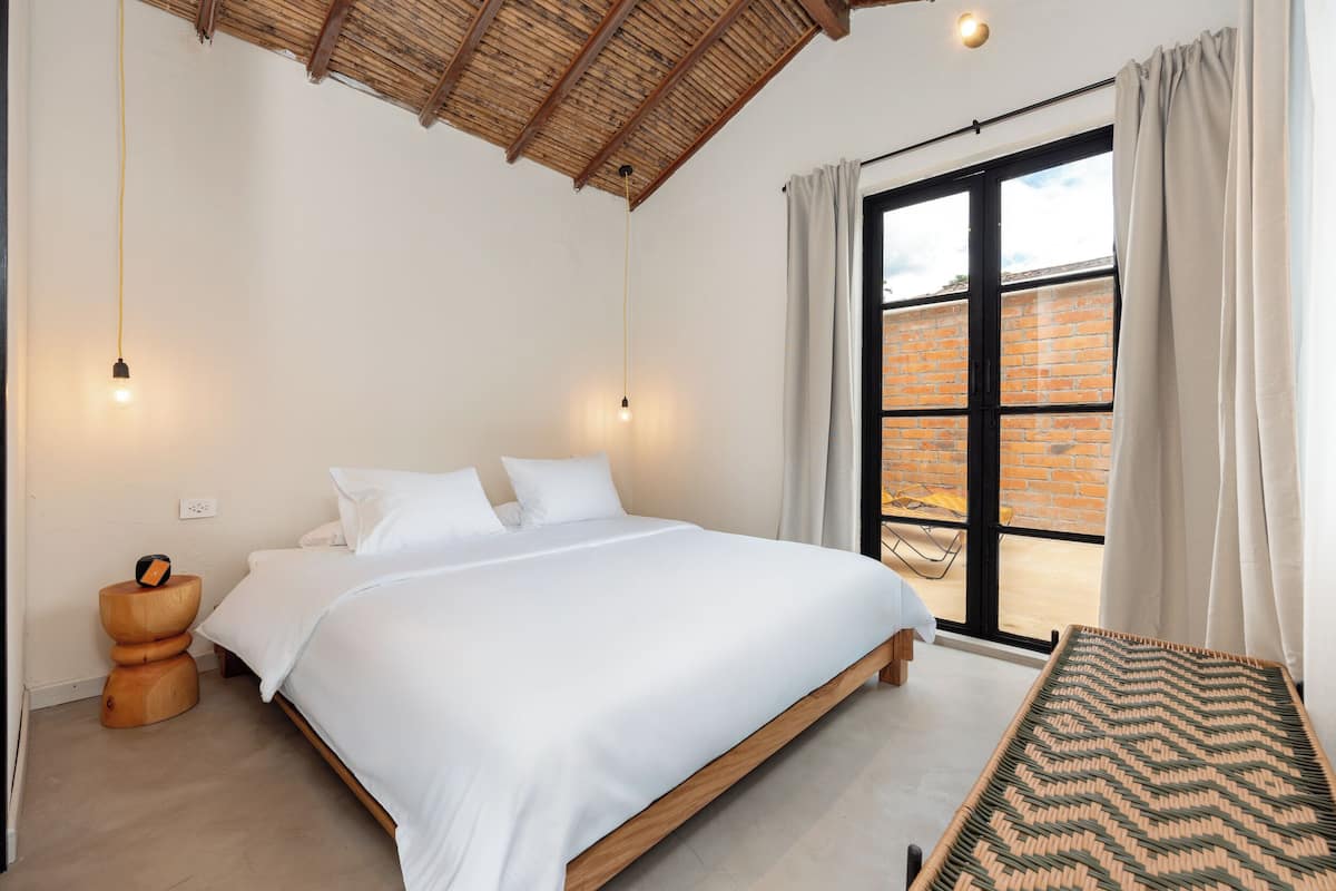 Double Room, Patio, Courtyard View | In-room safe, blackout curtains, free WiFi