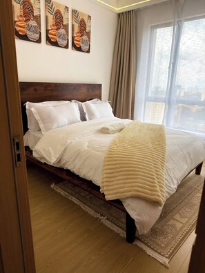1 bedroom, iron/ironing board, WiFi, bed sheets - Luxury 1BR Apartment with Pool, Gym, Balcony near Junction Mall. (Nairobi)