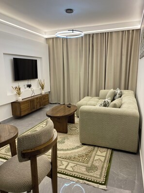 Living area - Luxury 1BR Apartment with Pool, Gym, Balcony near Junction Mall. (Nairobi)