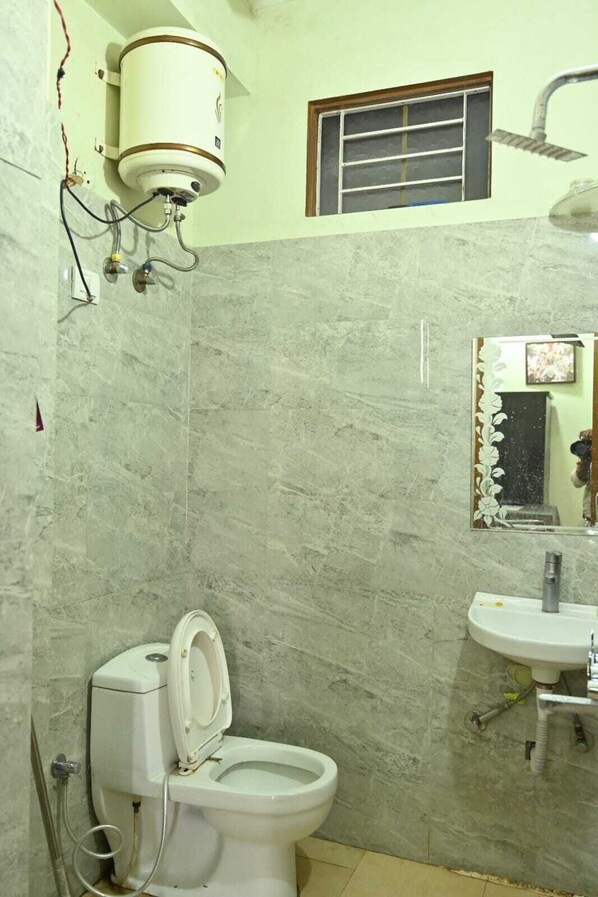 Shower, eco-friendly toiletries, soap, toilet paper