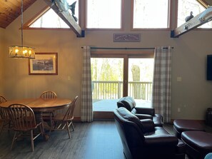TV, fireplace - Peaceful Riverfront Retreat on 5 Wooded Acres (Thompsonville)